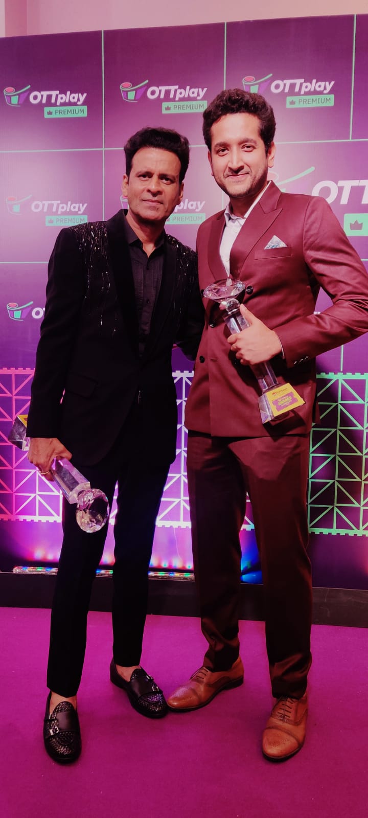 The talented actor Parambrata Chatterjee looks suave and handsome in a Wine color Bespoke double breasted suit.