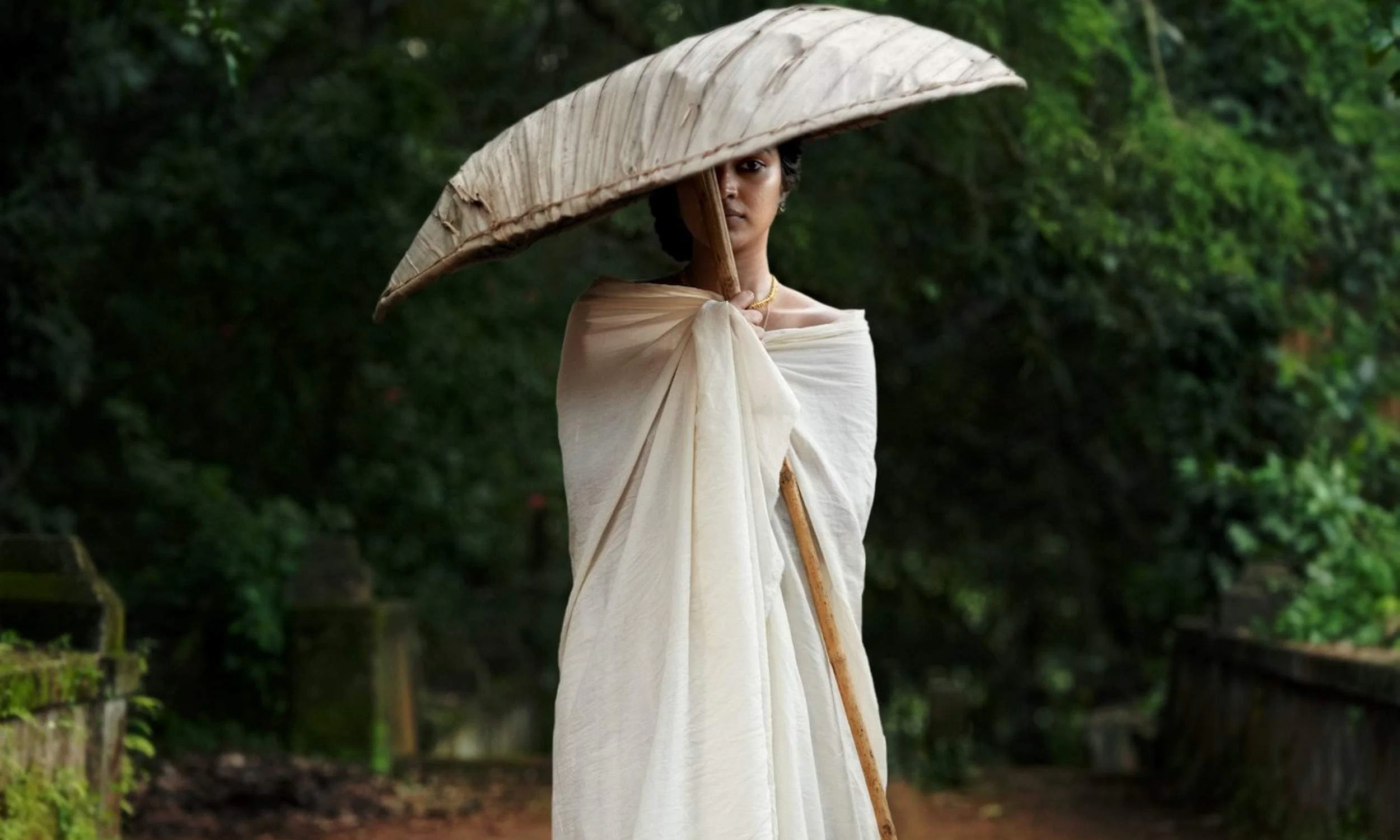 The intriguing First Look Poster of Amala Paul and Neeraj Madhav starrer 'Dvija' gets released