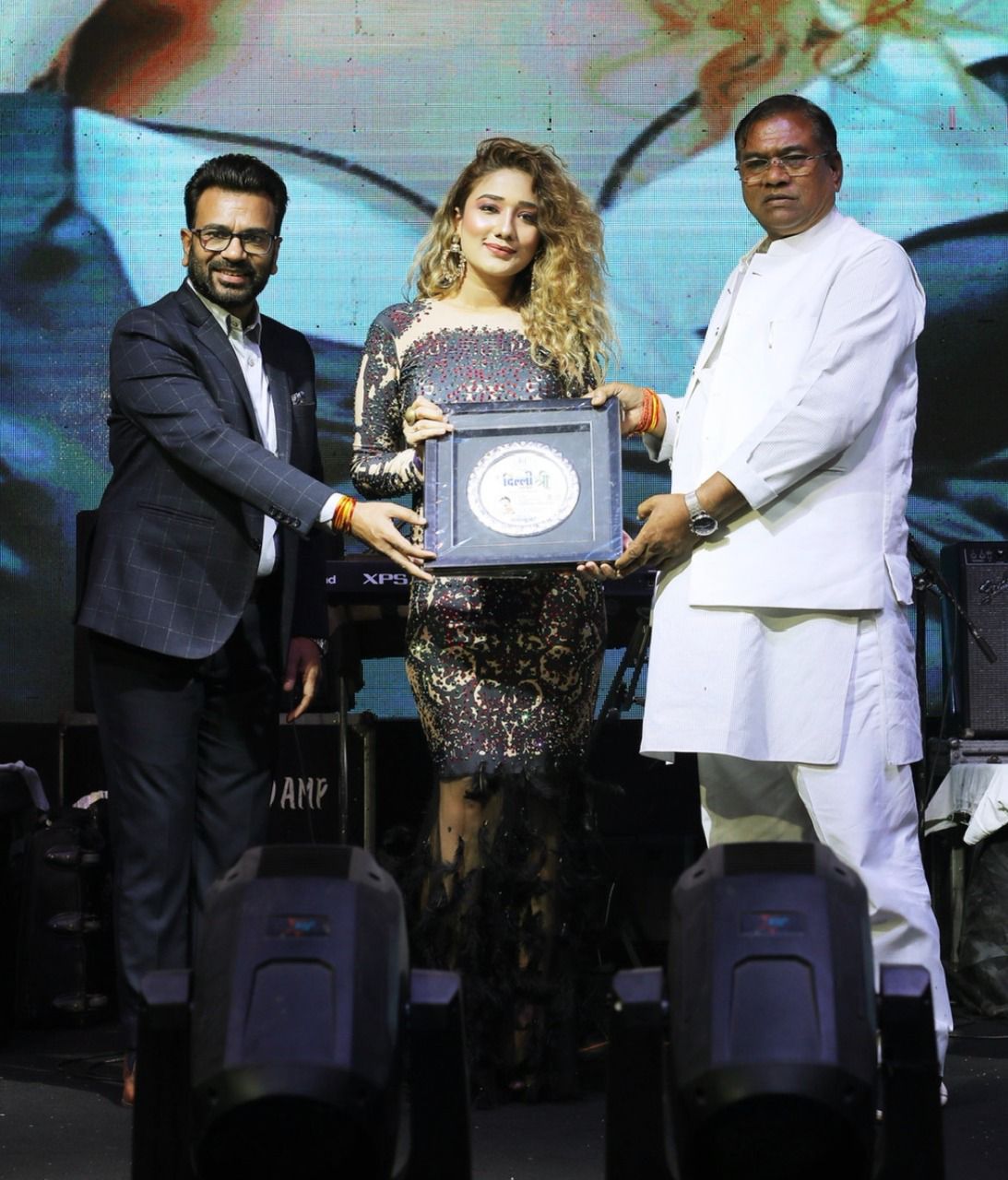Singer Megha Kishore receives an award; dedicates it to her parents
