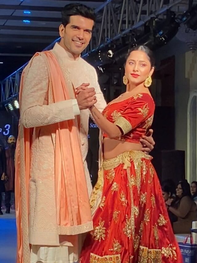 Kate Sharma oozes confidence and elegance on the ramp in Mehul Suthar’s red and gold bridal lehenga