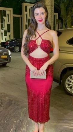Giorgia Andriani Celebrates Her Birthday in Style, Stunning in a Red Hot Shimmer Dress