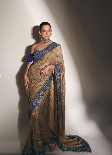 "Kangana Ranaut: The Regal 'Queen' of Bollywood's Saree Chronicles"