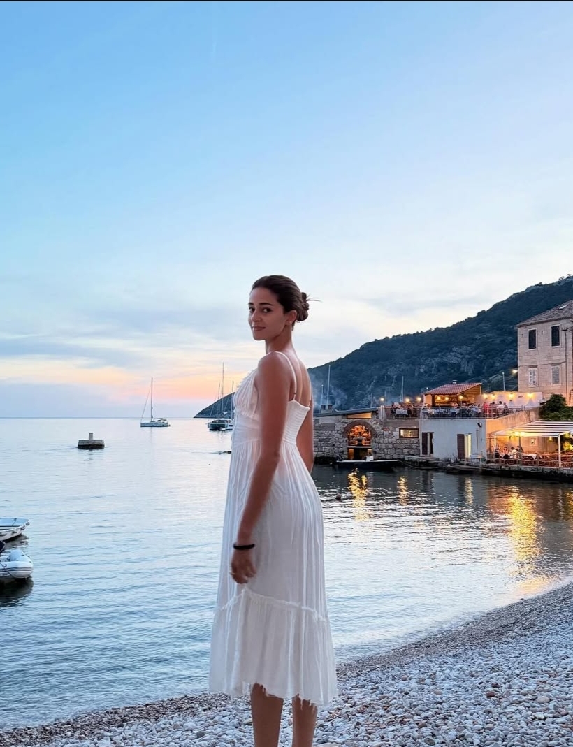 Ananya Panday's Vacation OOTD: A Stunning White Midi Dress and Effortless Chic
